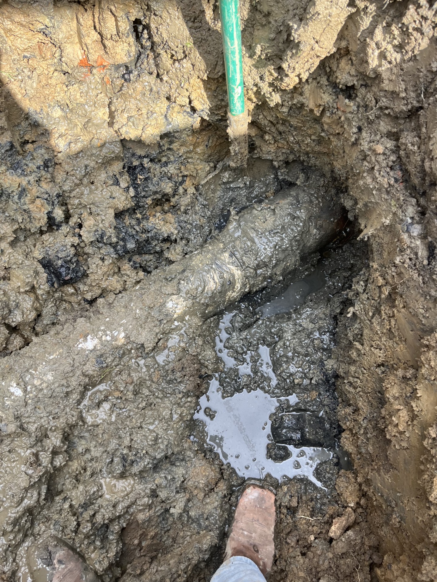 Excavated residential sewer line being serviced by First Installations LLC
